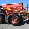 Hopper Bredal K105L with 12m auger and Claas Xerion