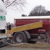 Loading of lime from the cistern into the the Bredal spreader  hopper